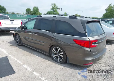 2021 Honda Odyssey Touring z USA, uszkodzony, nr VIN 5FNRL6H84MB002272
